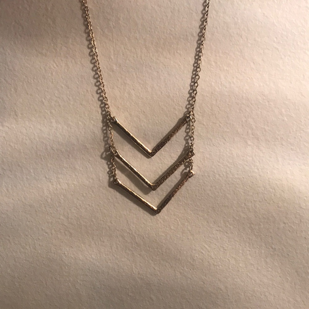 Long gold necklace